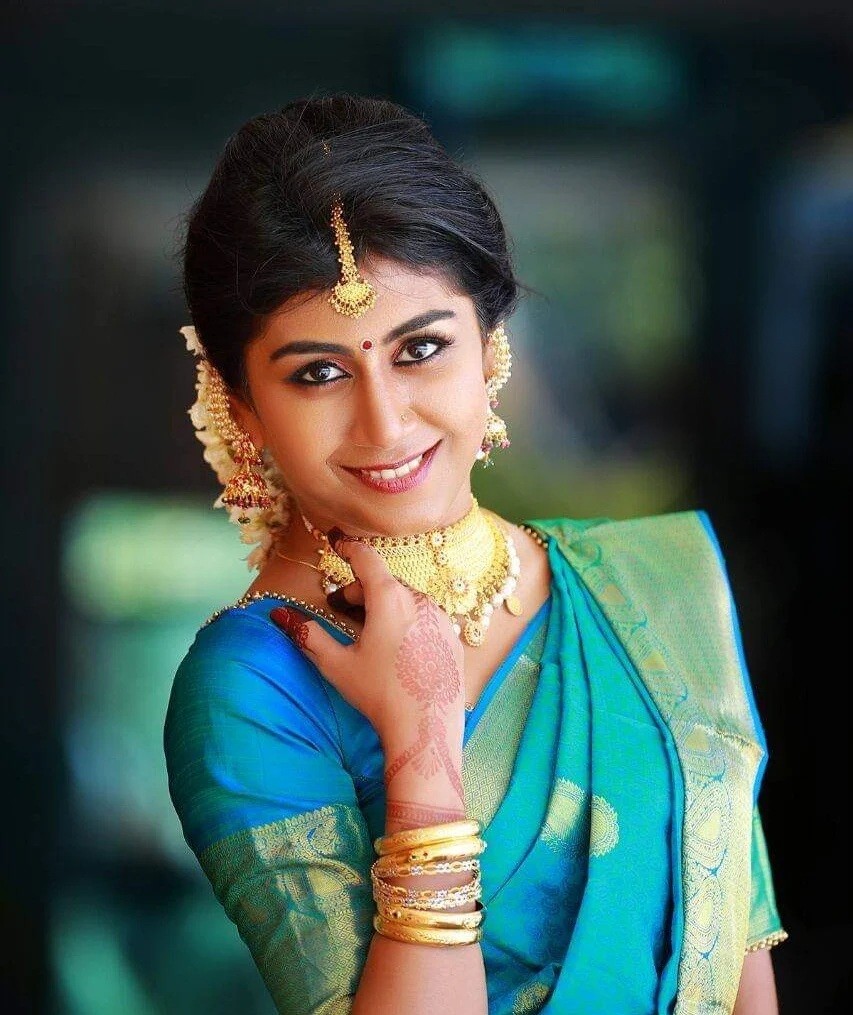 Traditional bridal makeup by Reenz